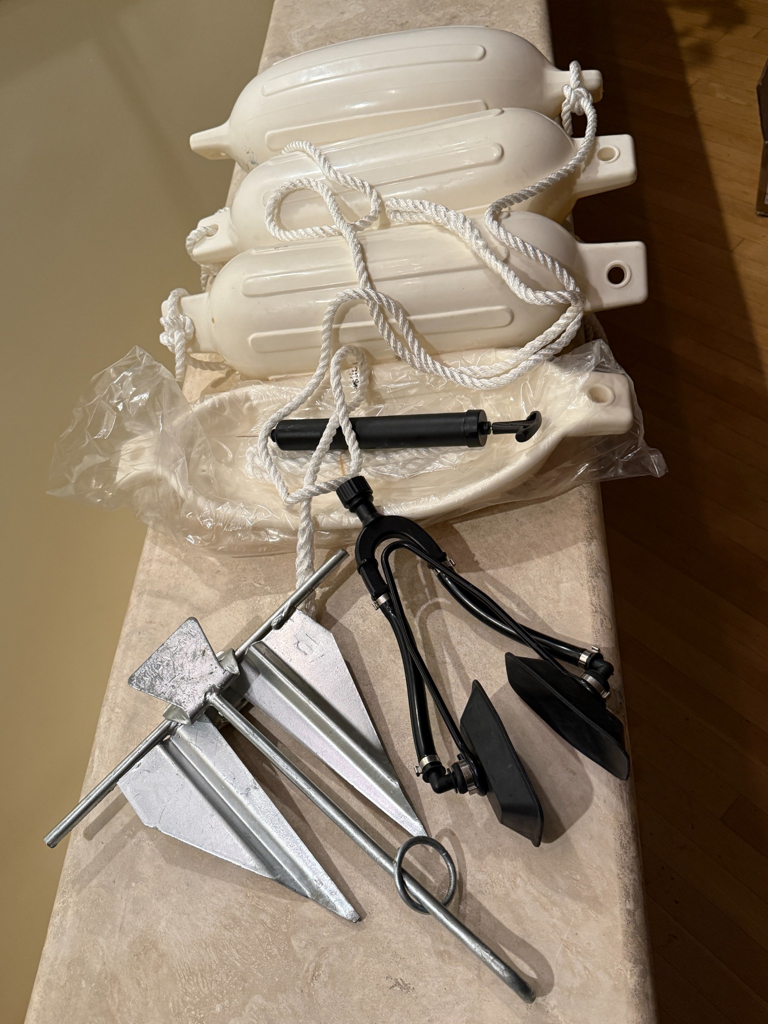 Fenders, anchors and pump collected for Decanter
